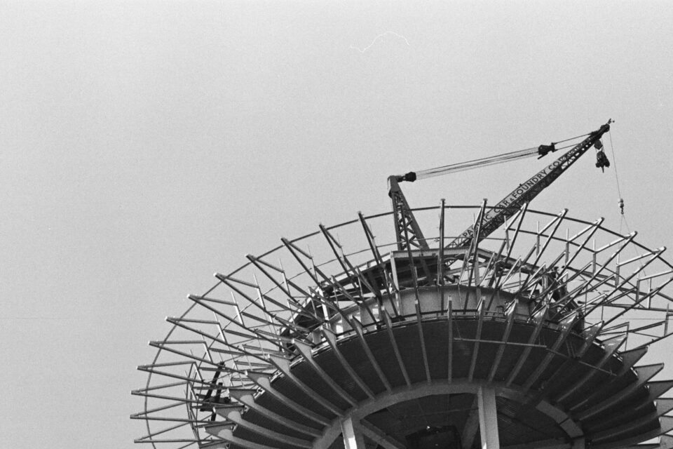 View looking up as the top of the Space Needle is under construction